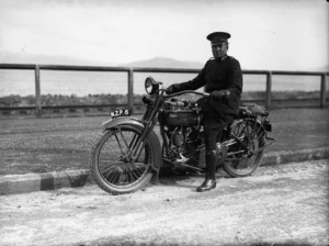 Constable Bert Spencer Morrison on a Harley Davidson motorcycle patrolling the Hutt Road