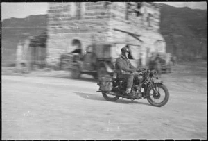 28th New Zealand (Maori) Battalion Dispatch Rider P J Gamel on his motorcycle, Southern Italy - Photograph taken by George Frederick Kaye