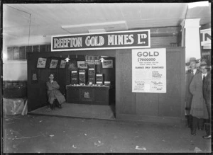Stall at a trade fair displaying information inviting interest in buying shares in Reefton Gold Mines Ltd.