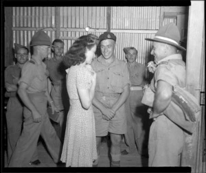 Grace Douglas talking to Trooper D M Urquhart and Coporal A T Dewer at Maadi Camp, Egypt, during World War 2