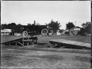 Demonstrating the strength of an Overland motor car