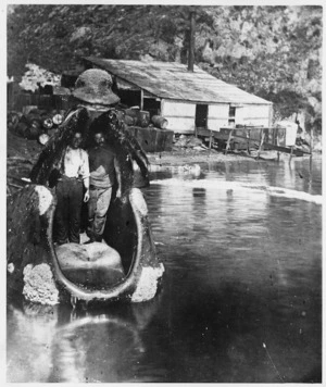 Wellington Harbour Board : Photograph of Joe Perano Senior and Arthur Heberly, standing inside the mouth of a whale, Tipi Bay, Cook Strait