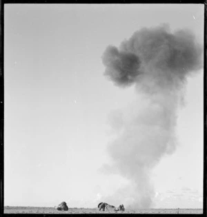 New Zealand infantry under shellfire, Western Desert, North Africa, during World War 2 - Photograph taken by H Paton
