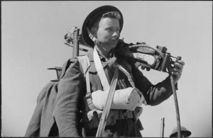 World War II soldier of 27 Machine Gun Battalion, on manoeuvres with a Vickers gun - Photograph taken by J White