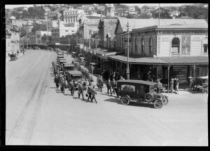 Funeral procession turning from Lambton Quay into Bowen Street during the funeral of Mother Mary Aubert