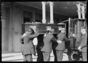 Casket being placed in the hearse during the funeral of Mother Mary Aubert