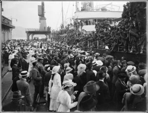 Crowd watching troops embarking for duty, World War One