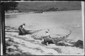 Men of the Dellabarca family, fishing at Lowry Bay, Eastbourne, Lower Hutt