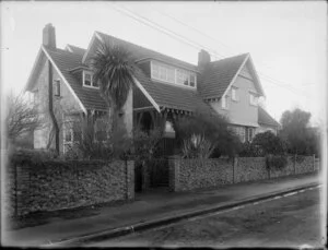Two storey house and garden with brick wall, Christchurch