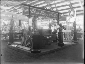 Display of pianos for Charles Begg & Co, at an industral exhibition
