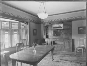 Dining room interior, [Christchurch?], including leadlight windows and Art Nouveau frieze