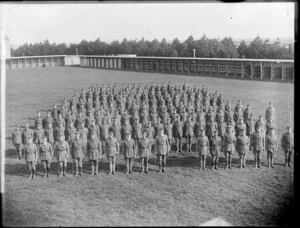 Group [company?] of New Zealand Army soldiers standing at attention