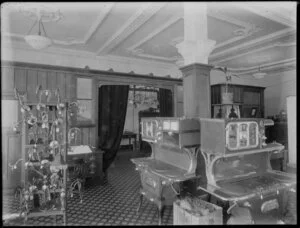 Interior view of a shop selling electric stoves and light fittings