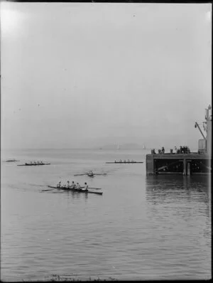 Coxed four rowing skiffs, [Wellington Harbour?]