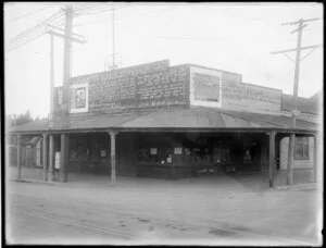 Shop on Ferry Road, Christchurch, covered with political slogans attacking William Massey and other political figures
