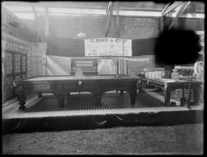 Display at an exposition of billiard tables by C Bird and Company, of 157-159 Willis St, Wellington