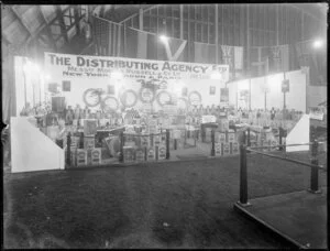 Display of goods associated witn the motoring industry, such as tyres and gasoline, at a motoring exposition