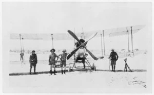Soldiers with bi-plane at Bir el Maler, Palestine, during WWI