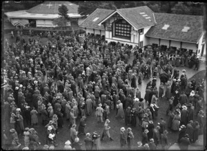 Crowds outside totaliser machines and selling booths at the races