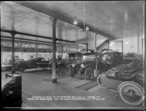 Display of Series 18 Studebaker Motor cars at Adams Ltd Motor Car Show Room, 152-154 High St, Christchurch (caption on plate)