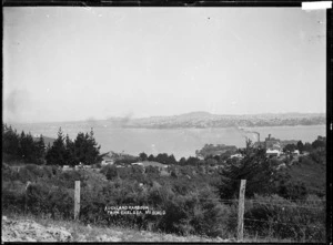 Auckland Harbour from Chelsea with Colonial Sugar Company works in the distance