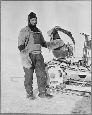 William Lashly standing by a Wolseley motor sleigh during the British Antarctic Expedition of 1911-1913
