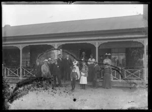 Group portrait outside a house