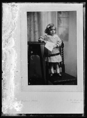 Copy photograph of of a mounted photograph of a child