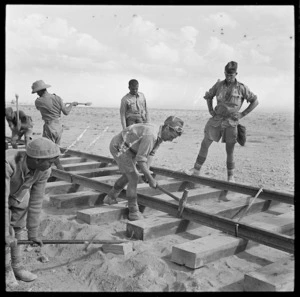 World War 2 New Zealand soldiers building a railway in the Western Desert during the advance into Libya - Photograph taken by M D Elias