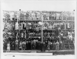 Construction workers at the site of the New Zealand Centennial Exhibition, Wellington, during a visit by the Prime Minister and his Cabinet Ministers - Photograph taken by Eileen Deste or her employee Neville d'Eresby Aickin