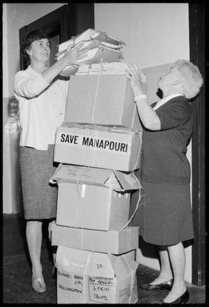 Mrs Lawson and Miss Bellett with boxes full of the Save Manapouri petition