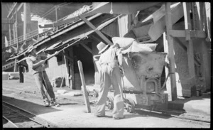 Loading cement into a railway truck, Golden Bay Cement Works, Tarakohe