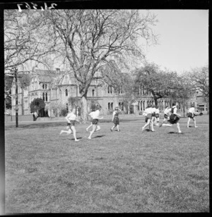 Girls from Christchurch Girls High School running in Cranmer Square, Christchurch