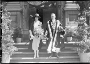 Mr and Mrs Norwood, Mayor and Mayoress of Wellington, on the steps of the Town Hall