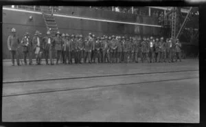 Soldiers lined up on wharf