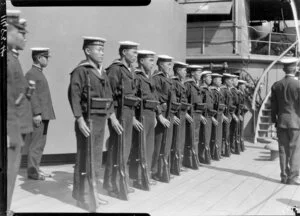 Japanese sailors lined up on deck of ship