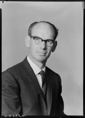 Unidentified bespectacled man in suit