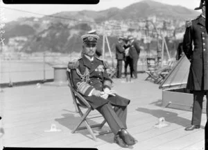 Japanese naval officer seated on ship's deck