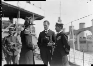 Japanese naval officers greeting welcome party on board the ship