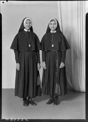 Two unidentified nuns in habits