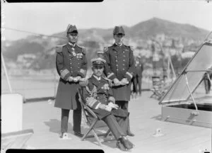 Three unidentified Japanese naval officers on ship's deck