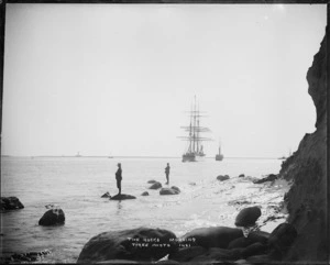 The Rocks, Nelson, showing a barque being towed