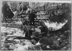 Denis Ryall driving dray along Nine Mile Beach, en route to Barrytown