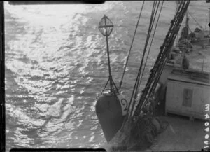 Buoy being lowered into sea from the Tutanekai