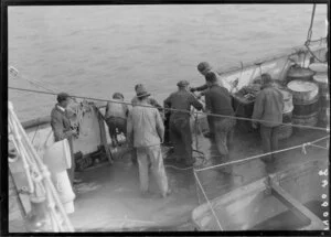 Unidentified men working on deck of Tutanekai
