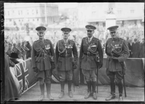 Four unidentified decorated military officer standing on dais