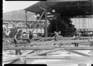 Men welding steel on waterfront construction site, Wellington