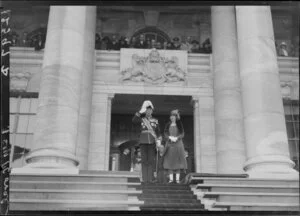 Sir Charles and Lady Fergusson on the steps of the Parliament Buildings, Wellington