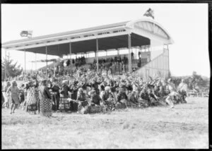 Maori performing in front of stadium
