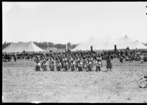 Maori performing in front of stadium